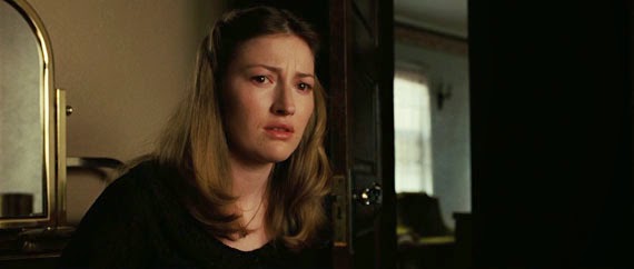 A photo of Carla Jean as killer Anton Chigurh attempts to force her to call "heads or tails" at her own coin toss during the movie No Country For Old Men.