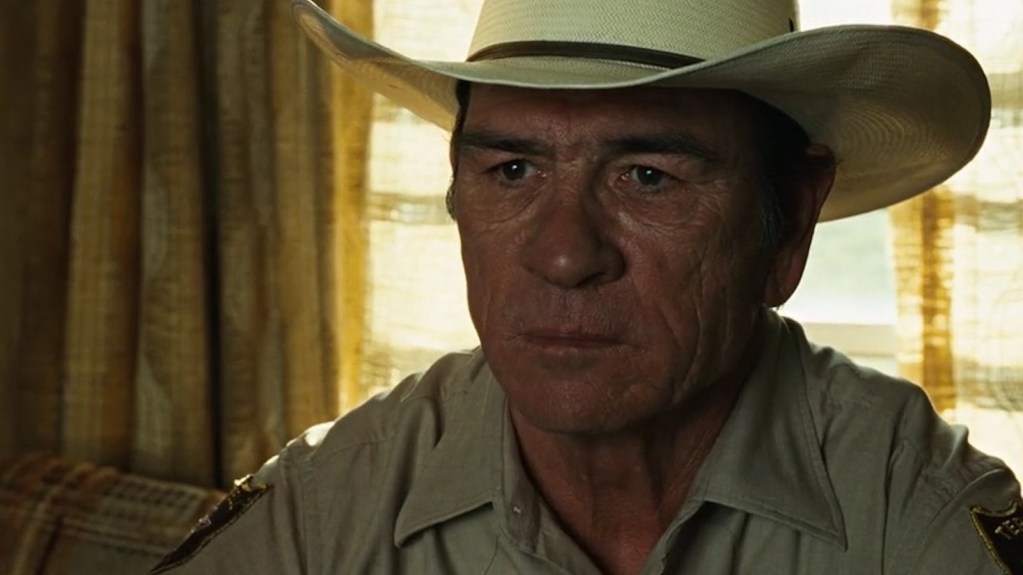 A photo of actor Tommy Lee Jones as Sheriff Ed Tom Bell from the movie No Country For Old Men.
